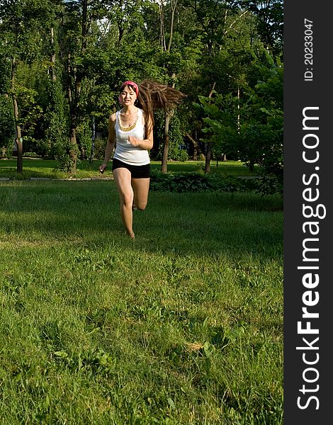 Girl walking outdoor in park