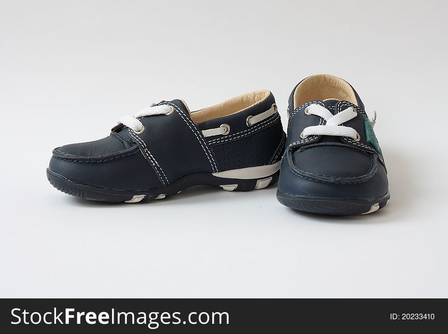 This photograph shows a pair of baby shoes. This photograph shows a pair of baby shoes.
