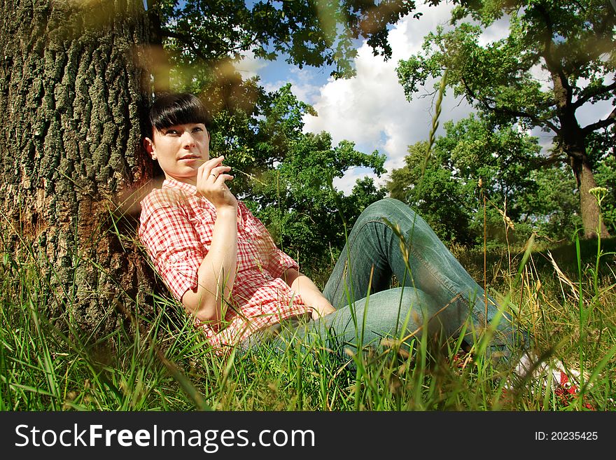 Beautiful young romantic woman in forest. Beautiful young romantic woman in forest