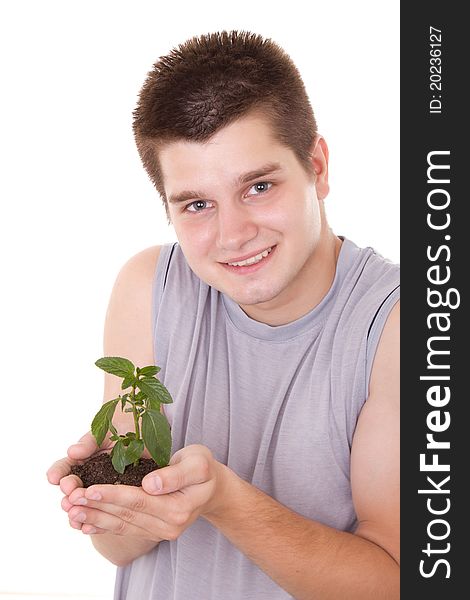 Man Holding A Plant