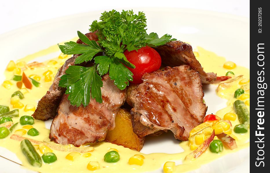 Grilled pork chop, close-up studio shot