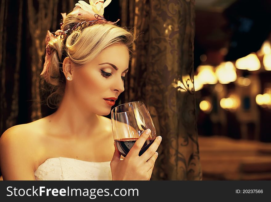 Beautiful Woman Drinking Red Wine