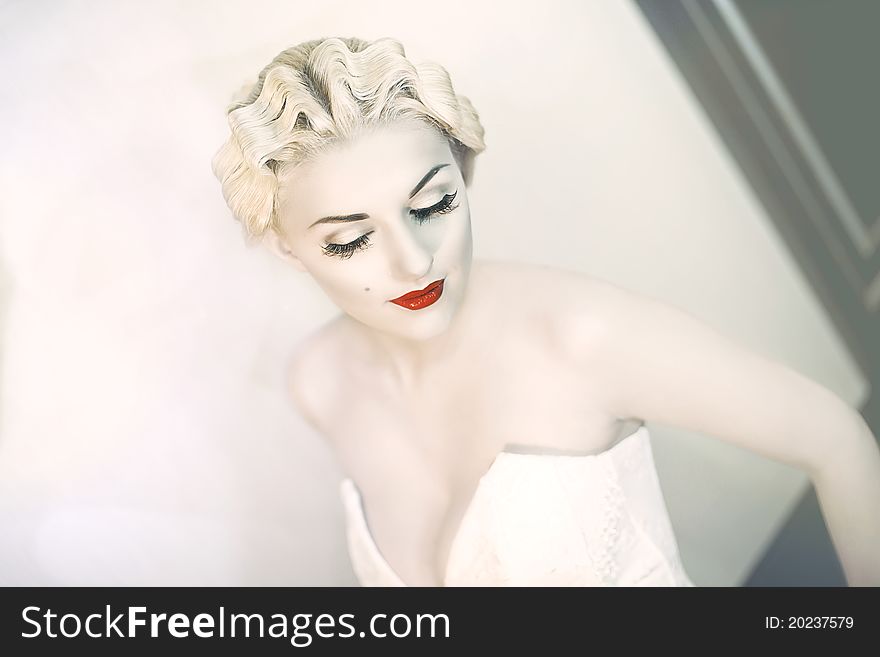 Fashion portrait of young  woman with red lips