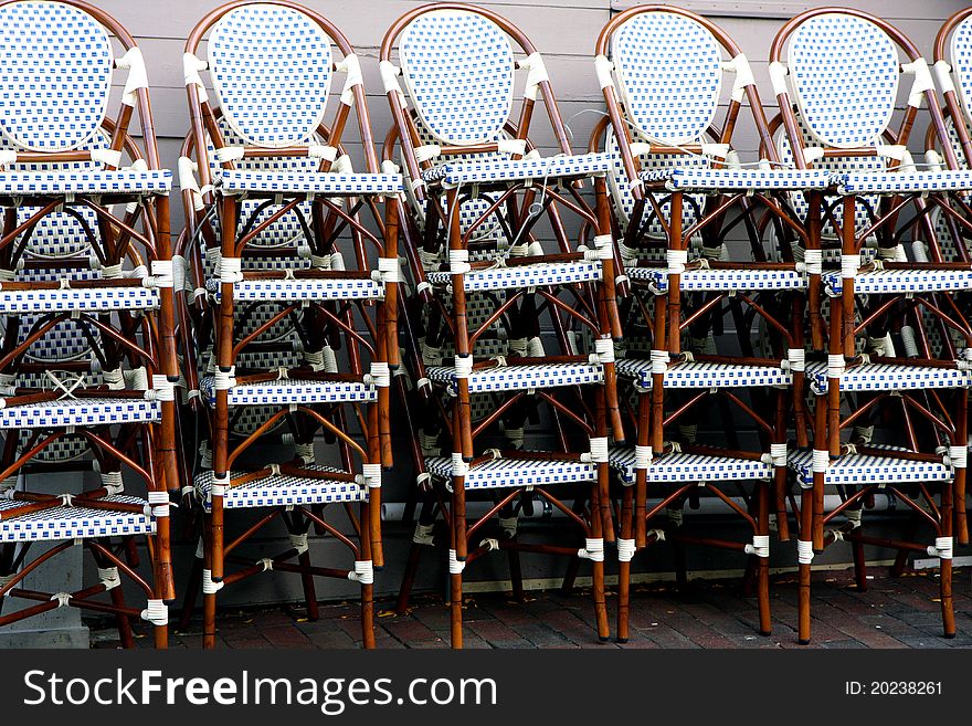 Pile of chairs stored in a cafe in Boston. Pile of chairs stored in a cafe in Boston