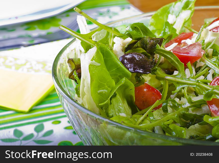 Freshness greens summery Rucola salat with tomatoes. Freshness greens summery Rucola salat with tomatoes