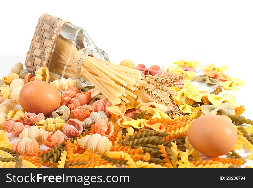 Different kinds of italian pasta on white background