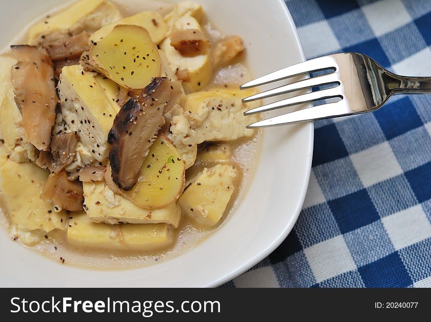 Asian mushroom and tofu dish ready to eat. Asian mushroom and tofu dish ready to eat.