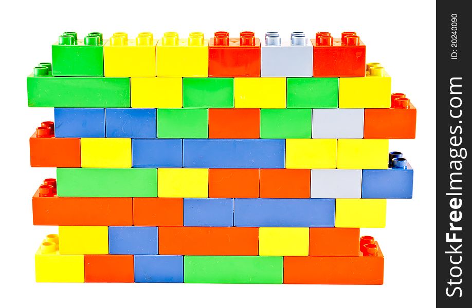 Plastic building blocks on white background. Bright colors.