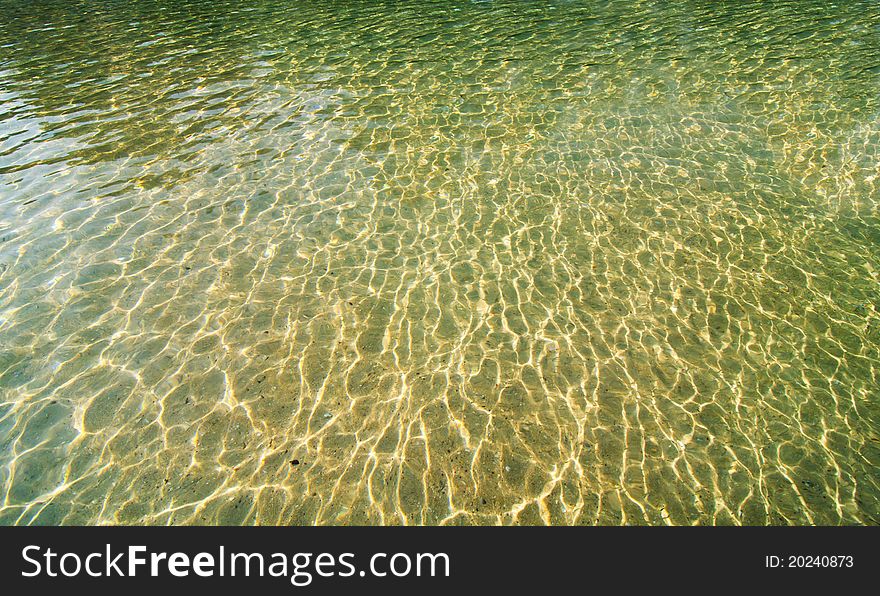 Sun reflection on the sea, green color