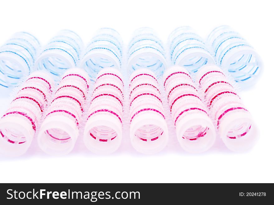 Curlers isolated on white background.