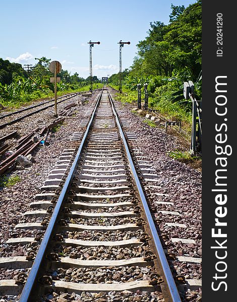 Straight railway in the countryside of Thailand