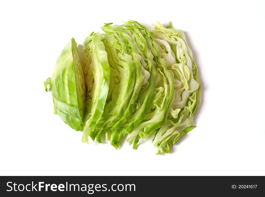 Cut in half fresh cabbage on a white