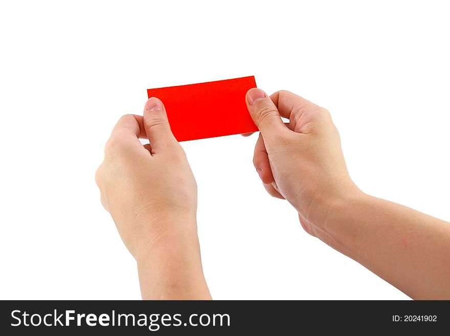 Woman's hands holding red card isolated on white