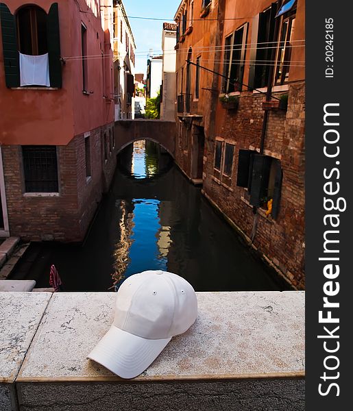 A white Cap on the Bridge the Grand Canal, Venice, Italy. A white Cap on the Bridge the Grand Canal, Venice, Italy