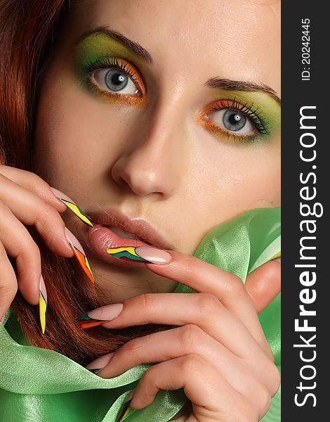 Girl with colorful makeup and beautiful nails. Girl with colorful makeup and beautiful nails