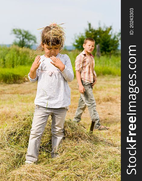 The girl with hay on the head. The girl with hay on the head