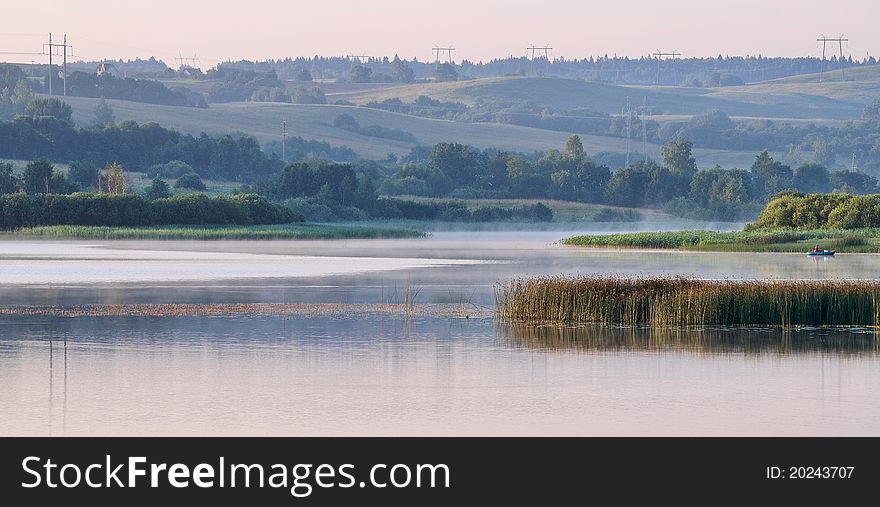 Early morning. A fog over lake. Early morning. A fog over lake