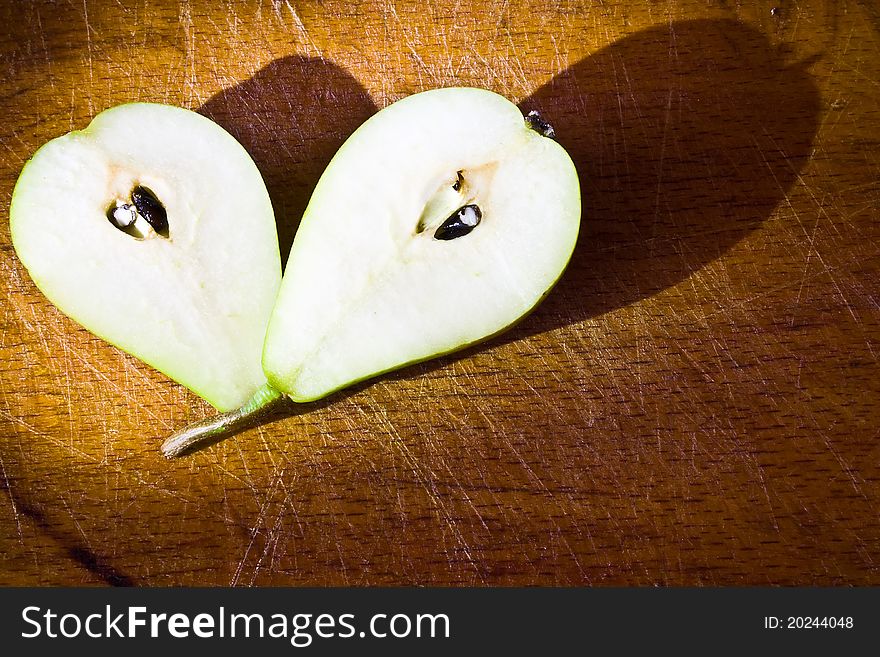 Closeup cut pear on the wood table