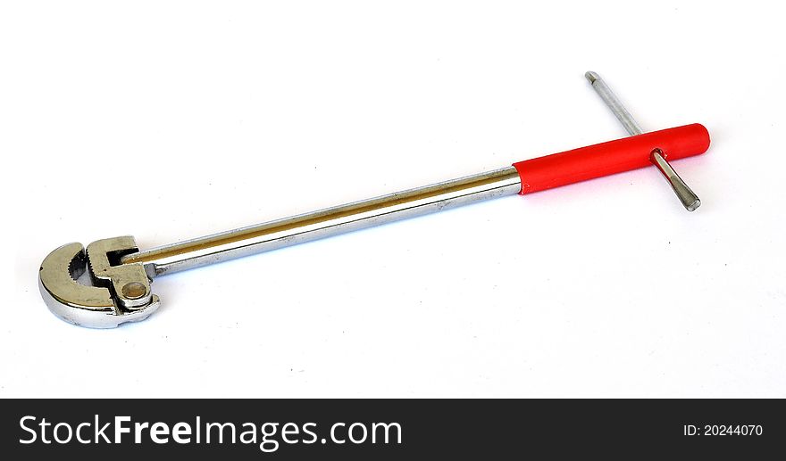 A long reach tap wrench used in areas where the hand can not fit, especially around bathroom sanitary ware. A long reach tap wrench used in areas where the hand can not fit, especially around bathroom sanitary ware