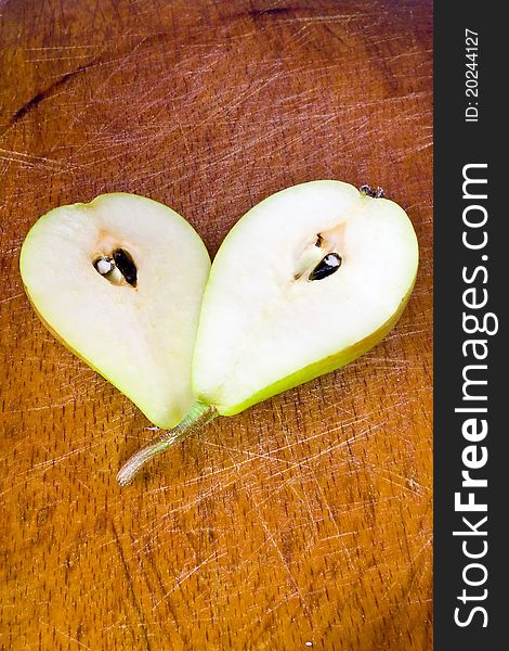 Closeup cut pear on the wood table