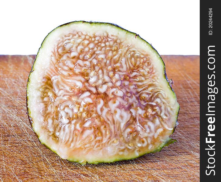 Closeup of ripe fig on the table. Closeup of ripe fig on the table