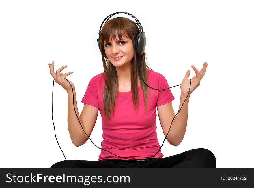 Beautiful young girl with headphones on her head. Beautiful young girl with headphones on her head