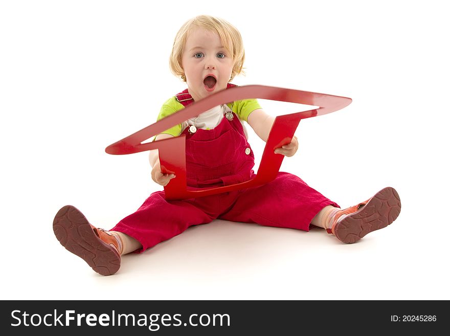 Child with red dart, conception business, on white background.