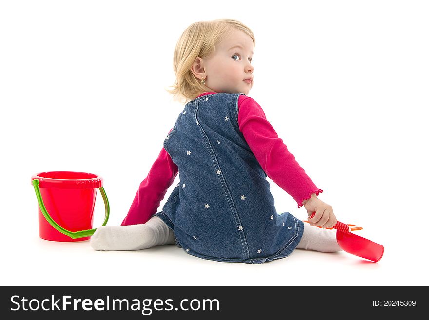 Child with toy, on white background.