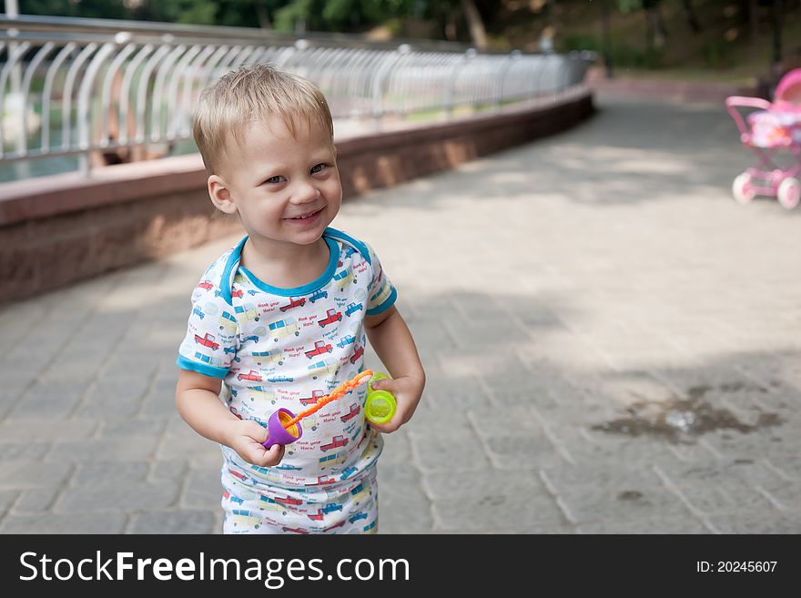 Little funny Boy Enjoying In summer park. Little funny Boy Enjoying In summer park.
