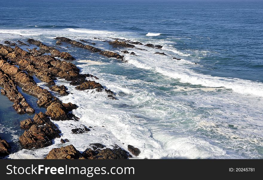 A rocky shoreline. Photographed in the Western Cape, South Africa.