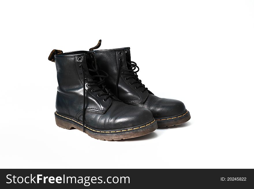A highly meritorious black leather boots worn. A highly meritorious black leather boots worn