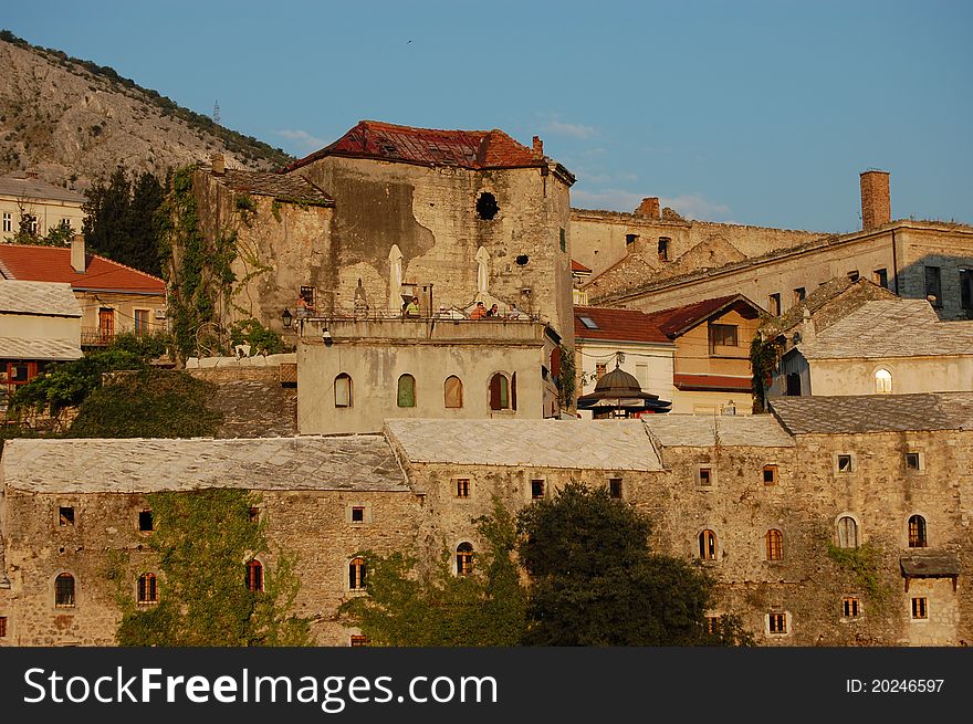 Buildings lit by the setting sun at Mostar, Bosnia and Herzegovina