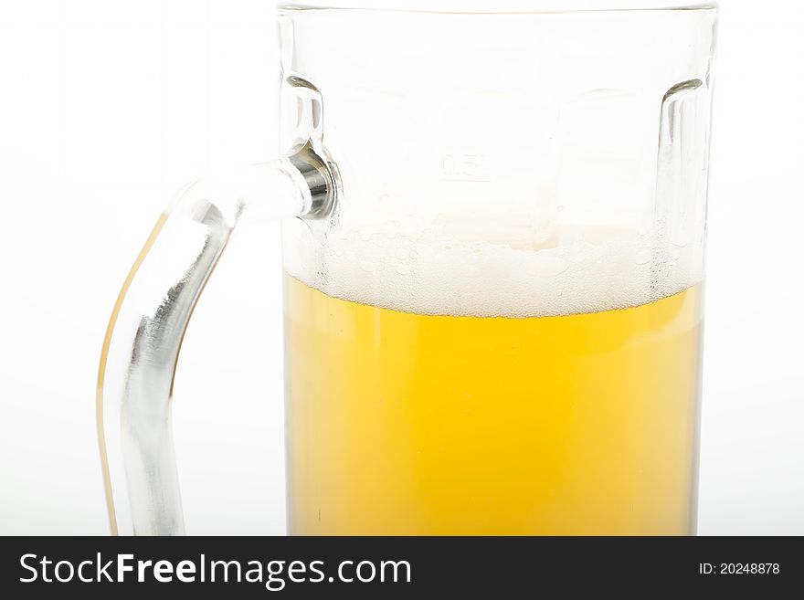 Beer in a mug isolated on white background