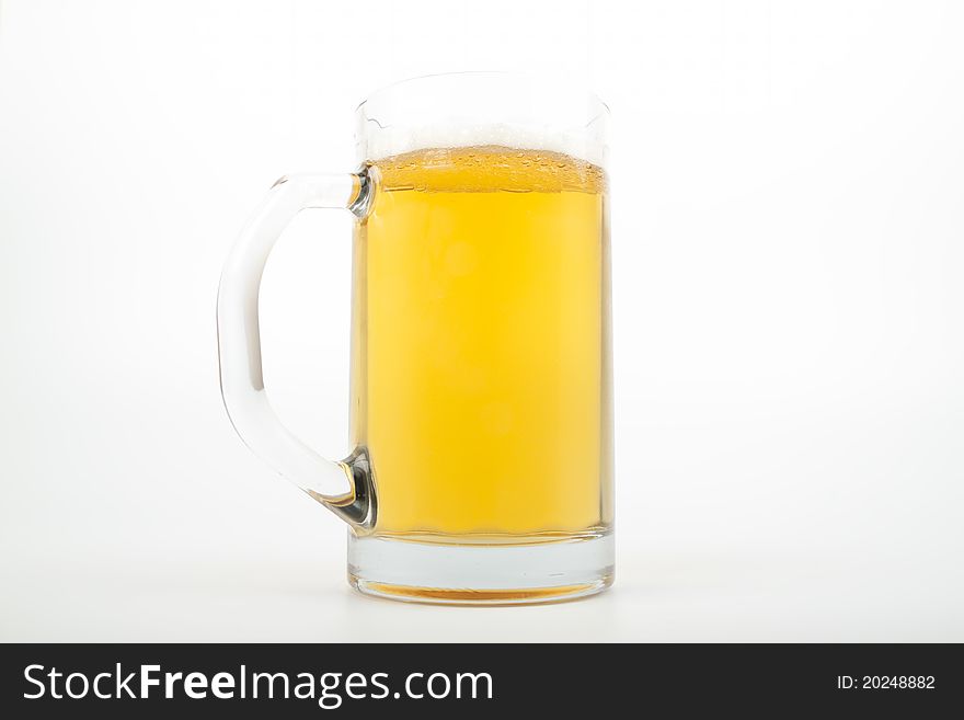 Beer in a mug isolated on white background