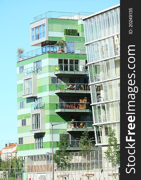 Modern building with pretty flowered balconies. Modern building with pretty flowered balconies