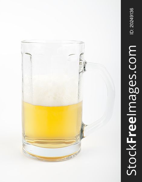 Beer in a mug isolated on white background