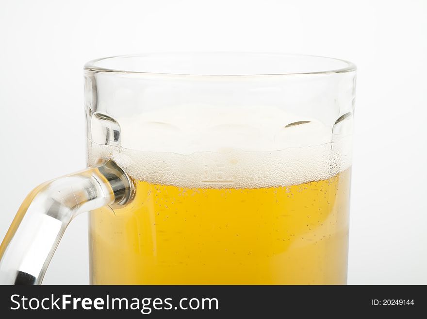 Beer in a mug isolated on white background