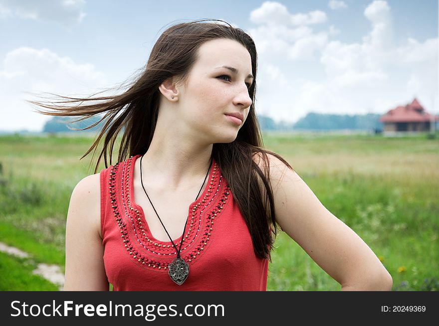Young Girl On A Summer Meadow