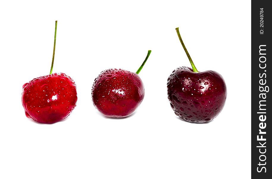 A trio of fresh, delicious cherries, from lightest to darkest!. A trio of fresh, delicious cherries, from lightest to darkest!