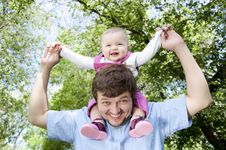 Father Plays With The Child Stock Images