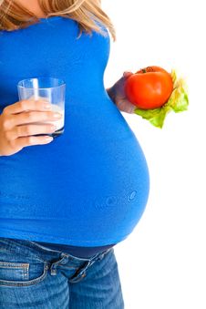 Pregnant Woman With Vegetables Stock Photo Pregnant Woman With Vegetables Stock Photo