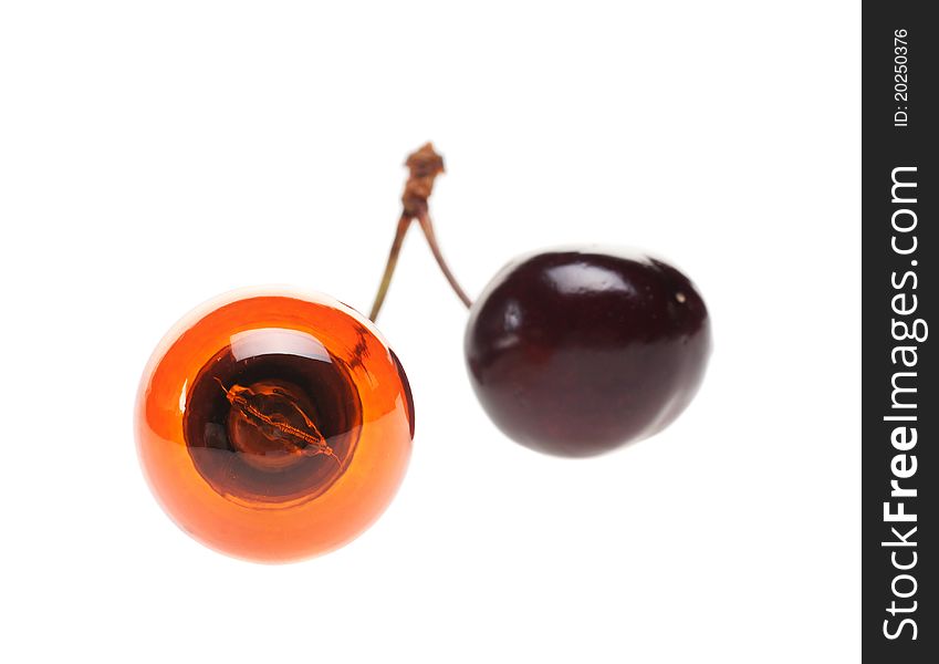 Isolated orange bulb with a cherry