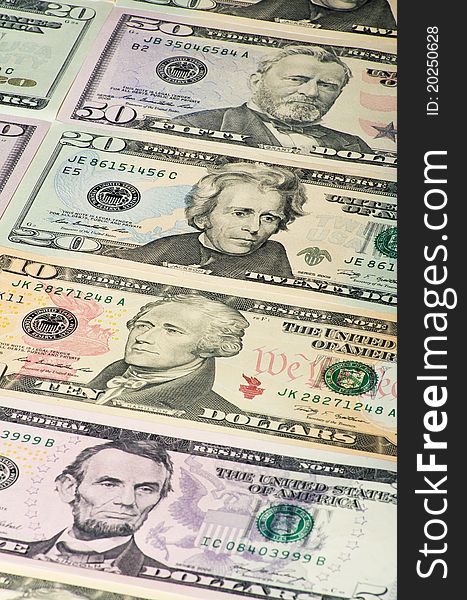 The background of U.S. dollars.
Banknotes of 5, 10, 20  and 50 dollars. The background of U.S. dollars.
Banknotes of 5, 10, 20  and 50 dollars