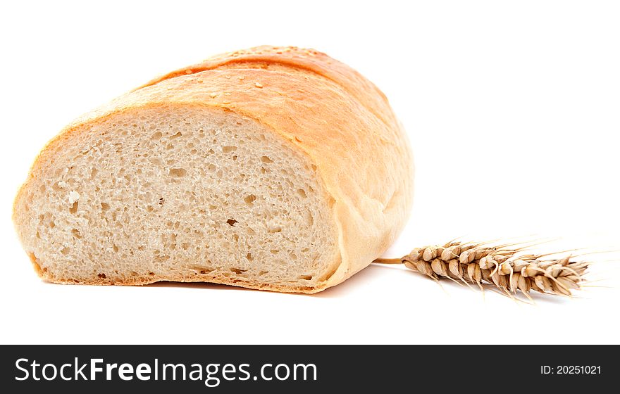 Spikelet wheat bread over white background