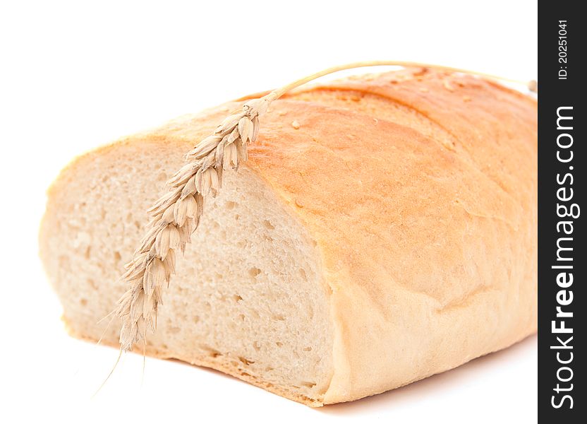 Spikelet wheat bread over white background