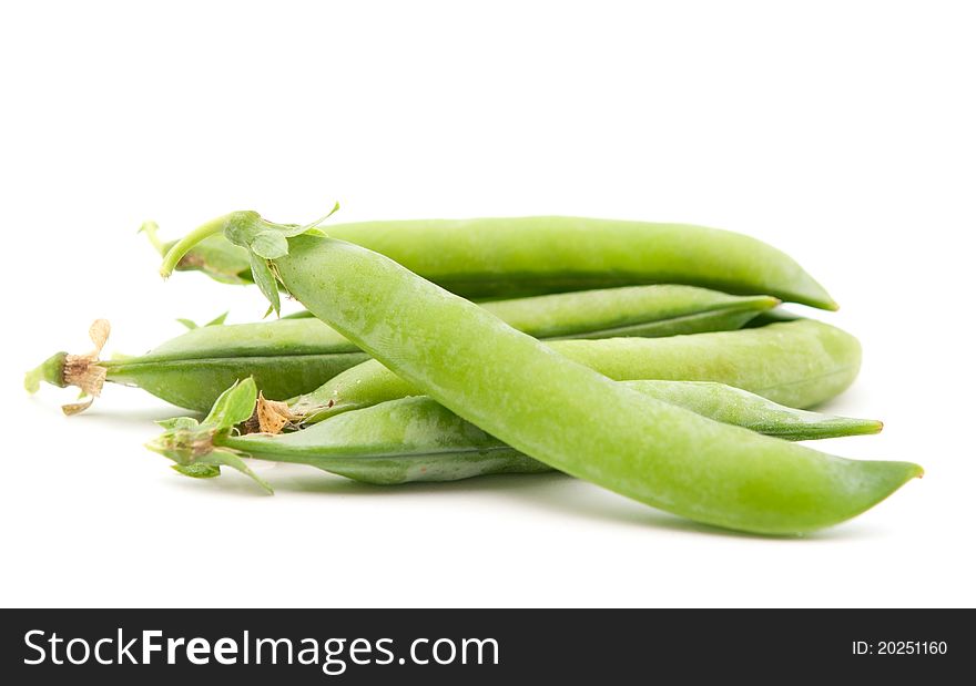 Green peas on a white background