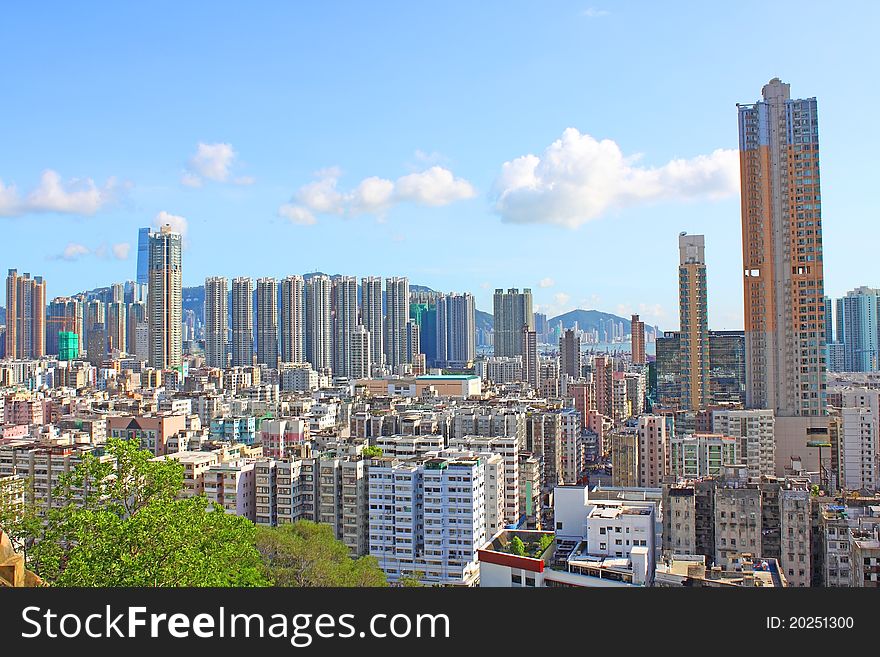 Hong Kong downtown with crowded buildings, it shows the stressful environment.