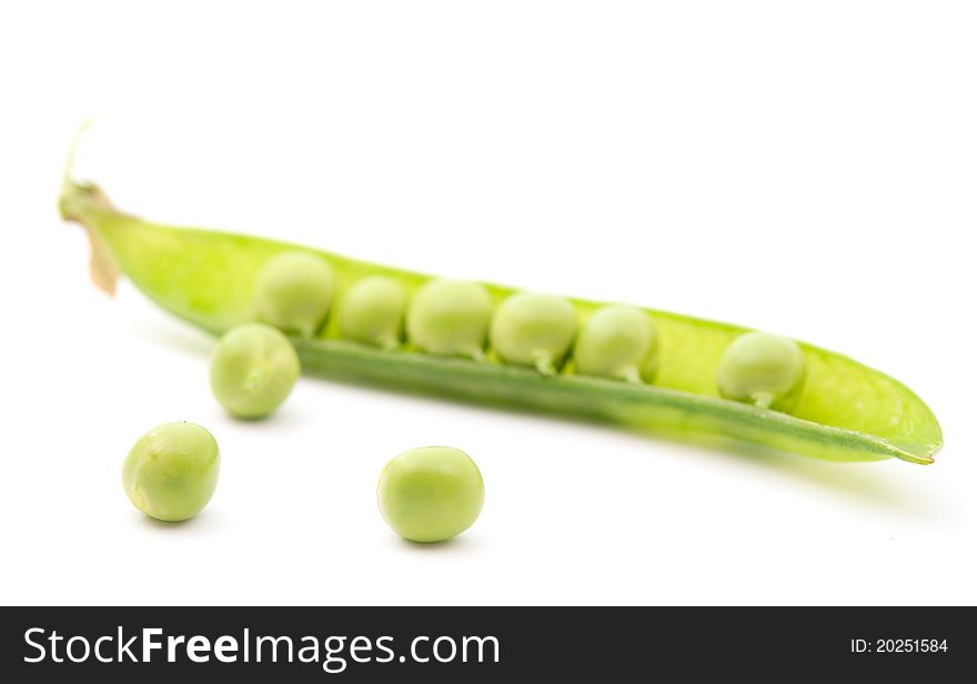 Green peas on a white background