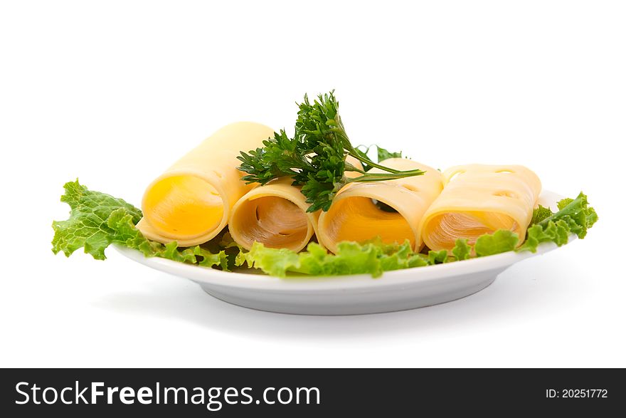 Cheese with greens in a bowl on a white background