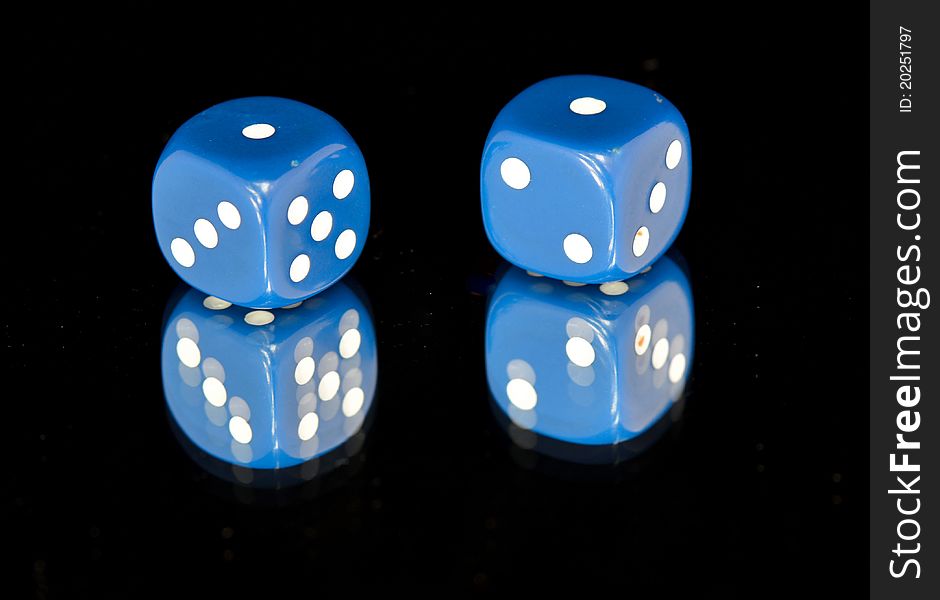 Dice take one blue cubes on a black background. Dice take one blue cubes on a black background